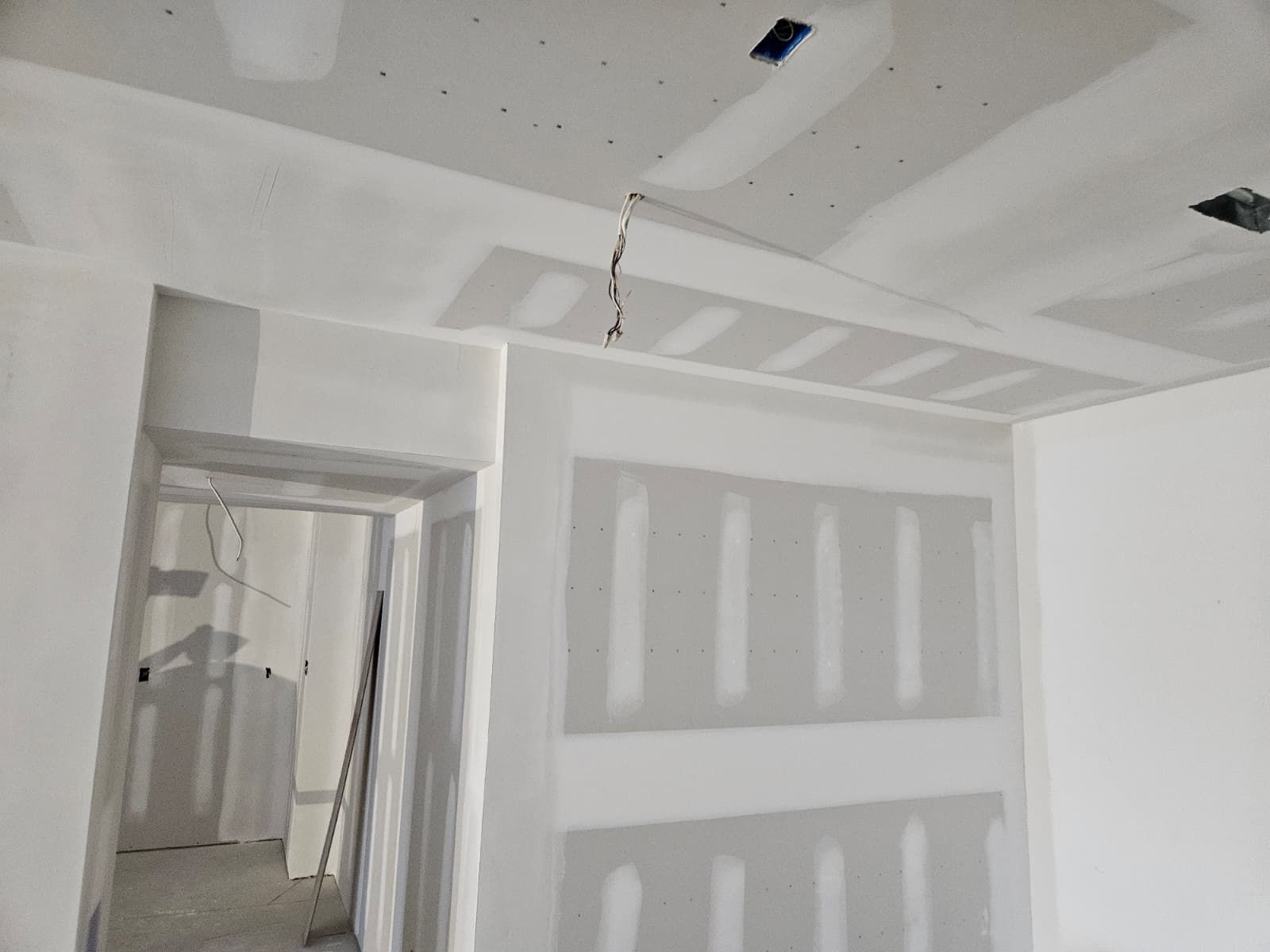 Mudded ceiling with light fixture wiring ready
