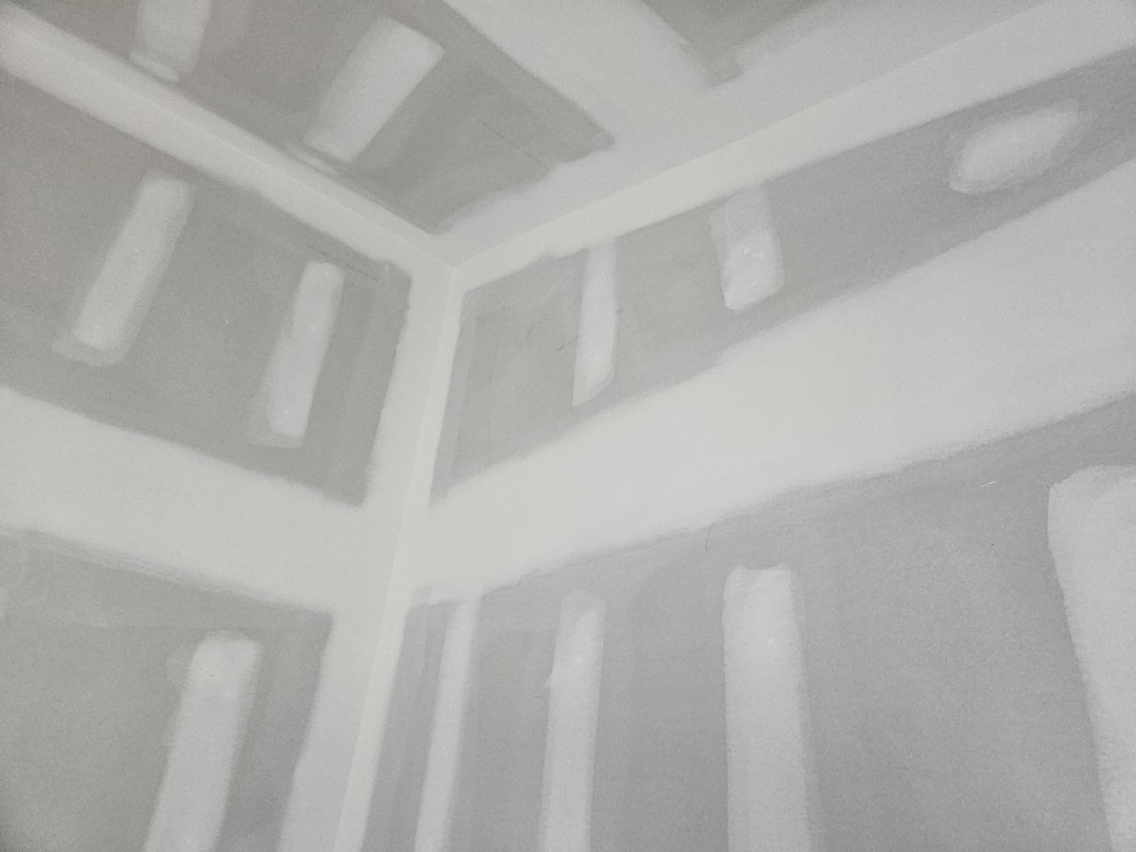 Ceiling and wall joints finished with joint compound