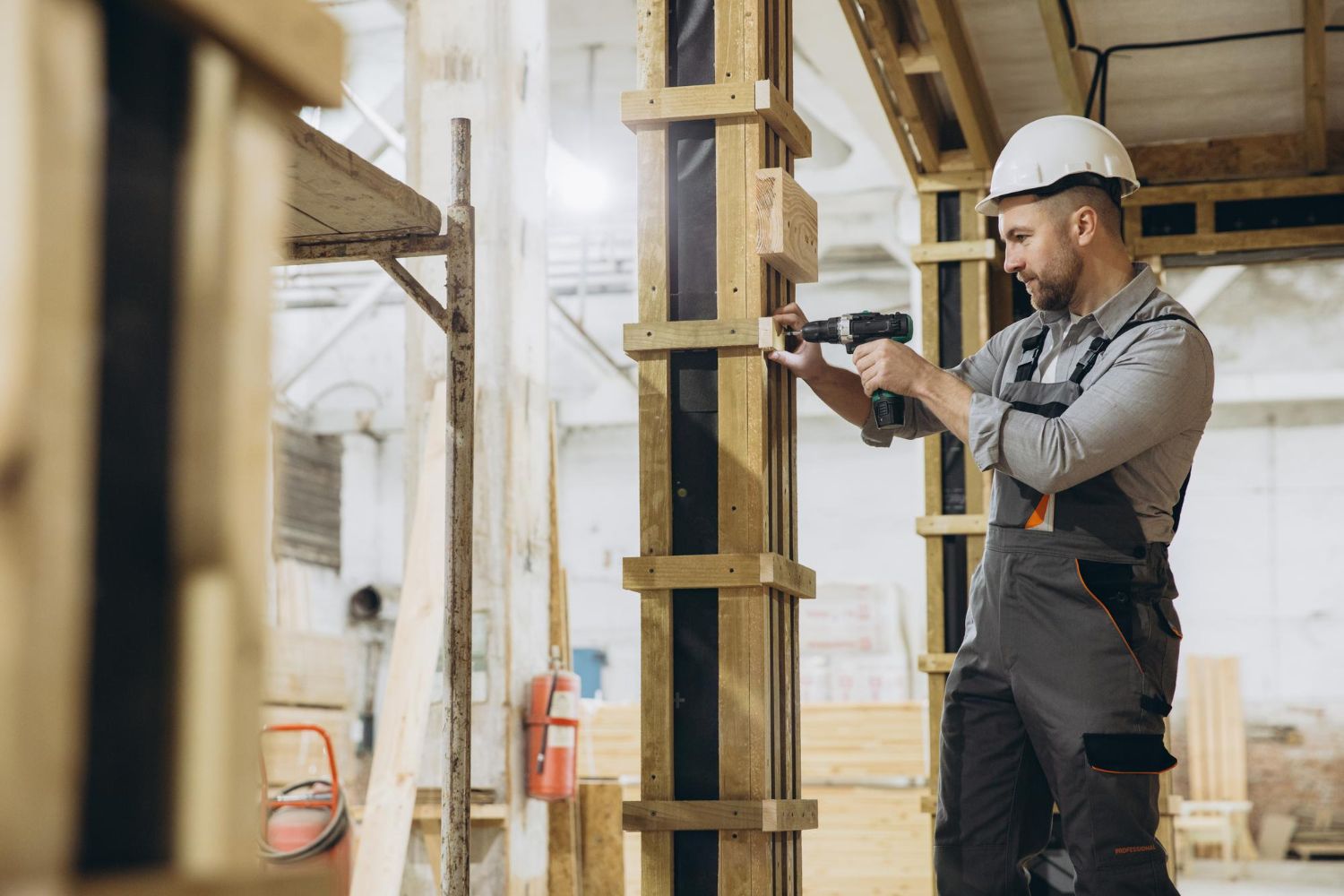 Fastening a wood post in a framed structure