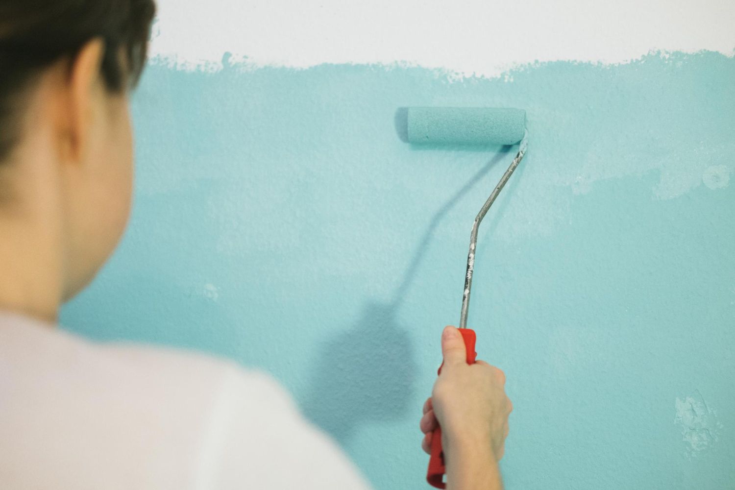 Rolling a new color onto an interior wall