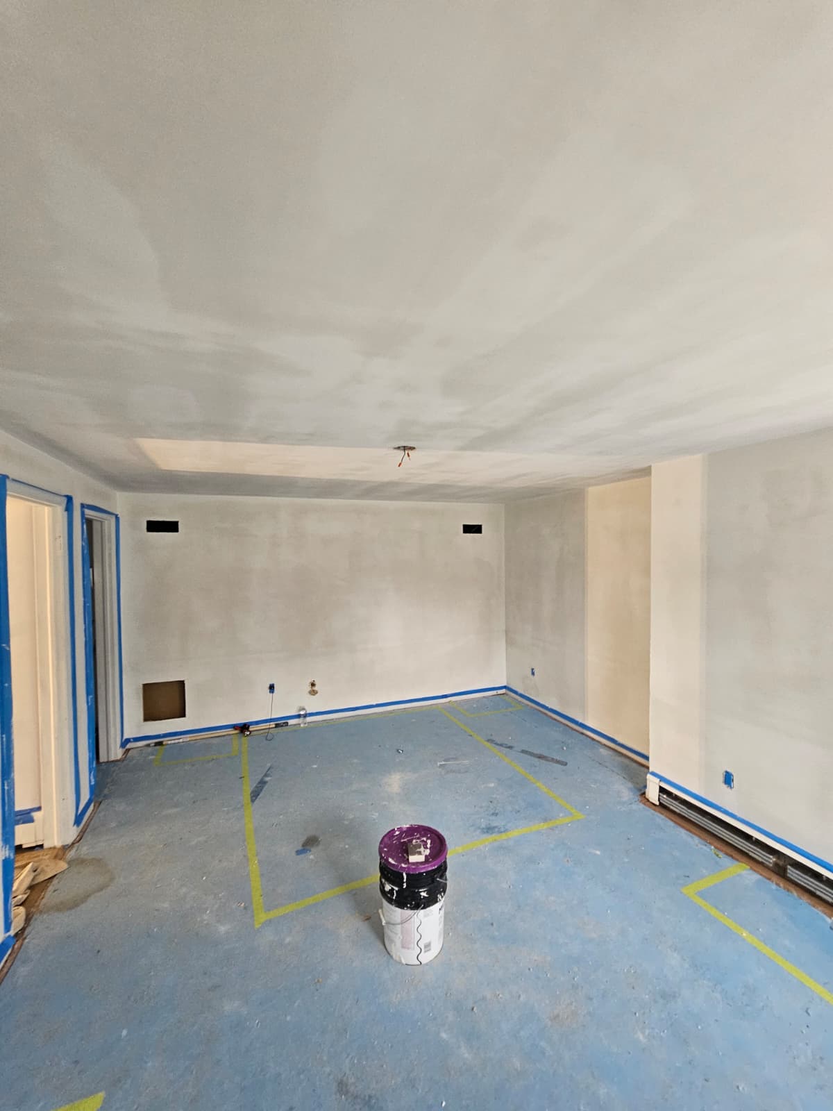 Ceiling sanded smooth for a Level 5 drywall finish